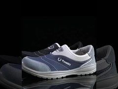 Calzature da lavoro in Kevlar a suola media antiproof Unisex PU Suede Calzature da lavoro di sicurezza industriale