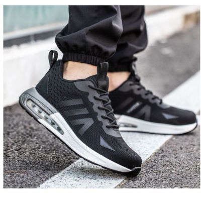 Scarpe di sicurezza industriale con suola a cuscino d'aria e design a maglia nera