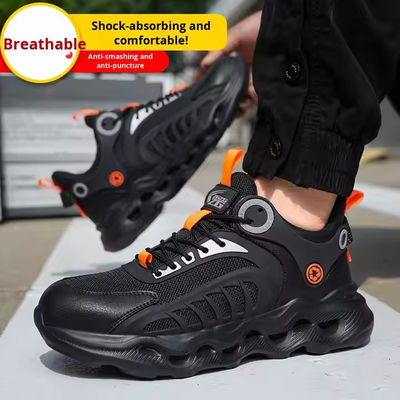 Scarpe da lavoro in maglia volante TPU con suola in EVA per la sicurezza industriale, intersuola in Kevlar, punta in acciaio, anti-perforazione e anti-schiacciamento